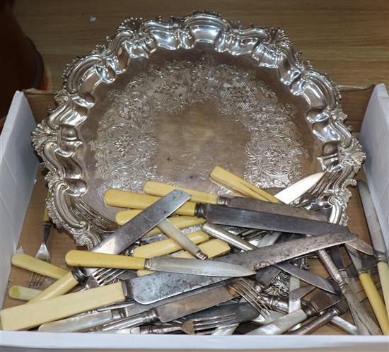 Nine assorted ivory handled knives and ten forks, a plated salver and other plated cutlery including carving knives.